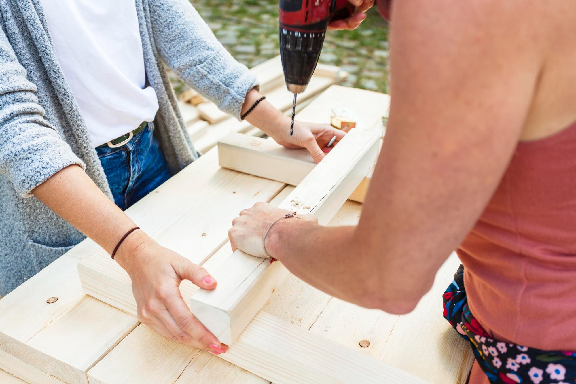 Illustration of two people working on a DIY project